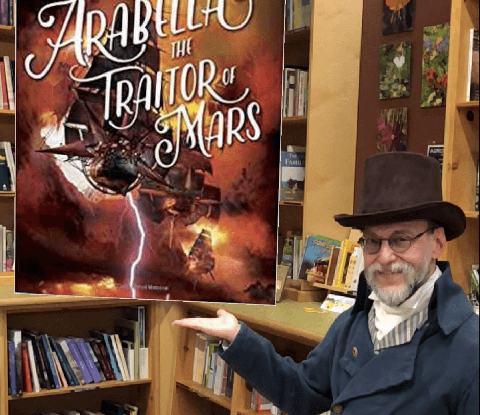 Author wearing steampunk gear holding with augmented reality overlay of his latest novel.